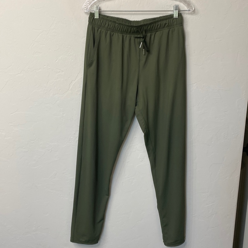 Zyia green nylon athletic pants size small.